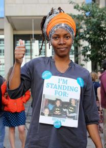 A HUCTW member joins in the union's Stand Out protest at a Harvard satellite campus