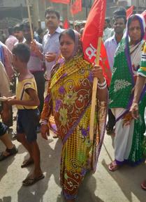 Workers on the march in the Wazirpur Industrial Area in Delhi during a general strike